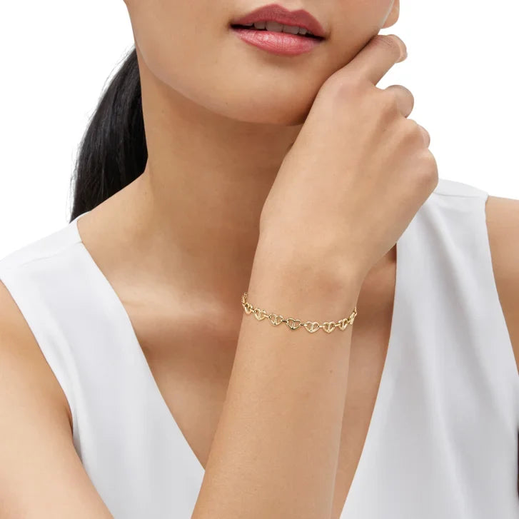 High Polish Heart Pretzel Bracelet in Yellow Gold