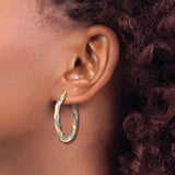 Diamond Cut Twisted Hoop Earrings in Two Tone Gold